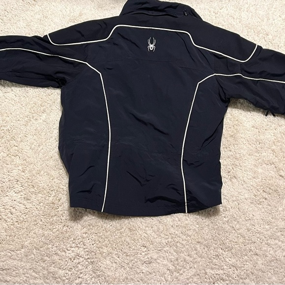 Black Spyder ski jacket with zip out liner that can be worn separately. - Picture 2 of 7